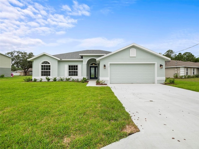 ranch-style home with a garage and a front yard