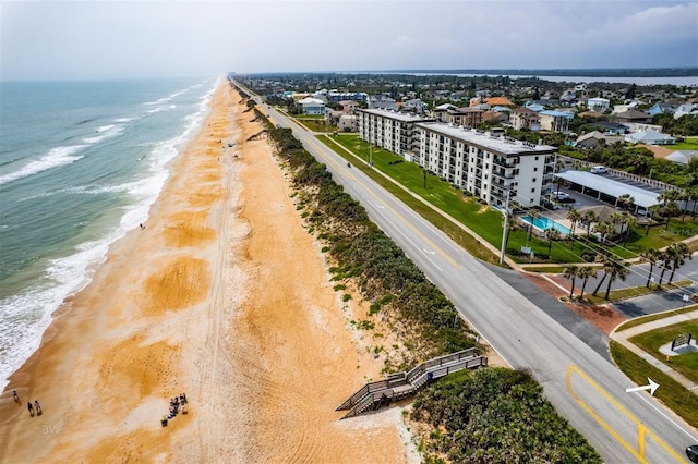 aerial view with a beach view and a water view