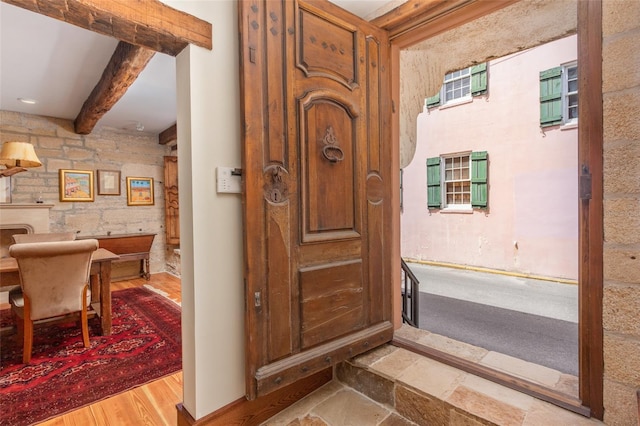 bathroom featuring beam ceiling