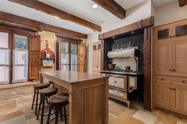 bar featuring beamed ceiling