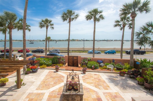 view of patio / terrace featuring a water view