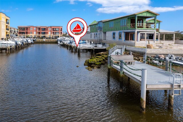 dock area featuring a water view