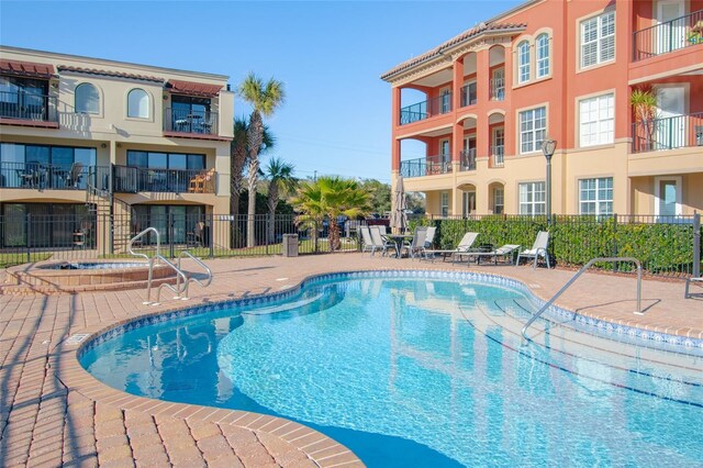 view of swimming pool featuring a patio