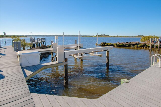 view of dock with a water view