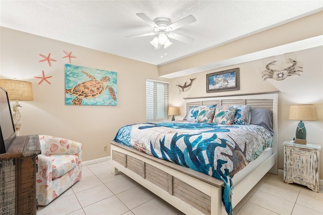 tiled bedroom with ceiling fan