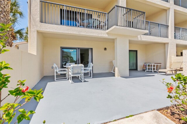 rear view of house featuring a patio area