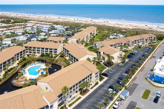 bird's eye view with a view of the beach and a water view