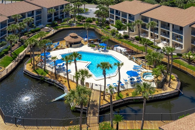 view of pool featuring a water view