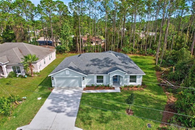 66 Ryland Dr, Palm Coast, FL 32164 - view of front of home with a front yard and a garage