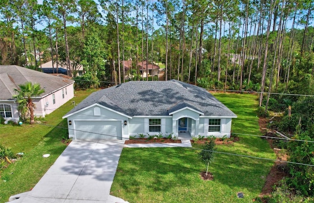 66 Ryland Dr, Palm Coast, FL 32164 - view of front of house with a front yard and a garage