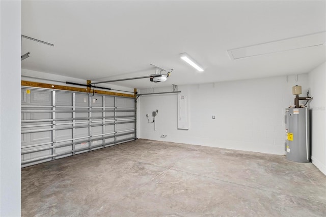 66 Ryland Dr, Palm Coast, FL 32164 - garage featuring electric water heater and a garage door opener