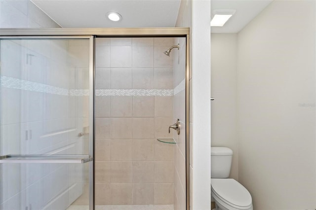 66 Ryland Dr, Palm Coast, FL 32164 - bathroom featuring toilet and walk in shower