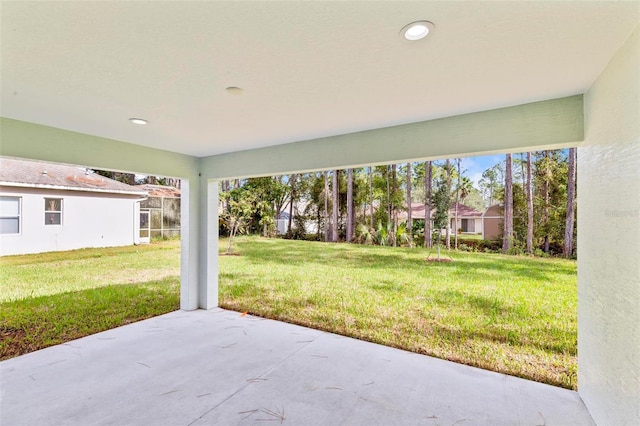66 Ryland Dr, Palm Coast, FL 32164 - view of yard featuring a patio area
