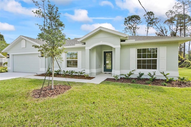 ranch-style home with a front lawn and a garage