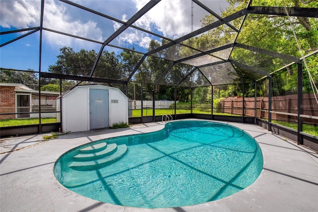 view of swimming pool with glass enclosure and a storage shed