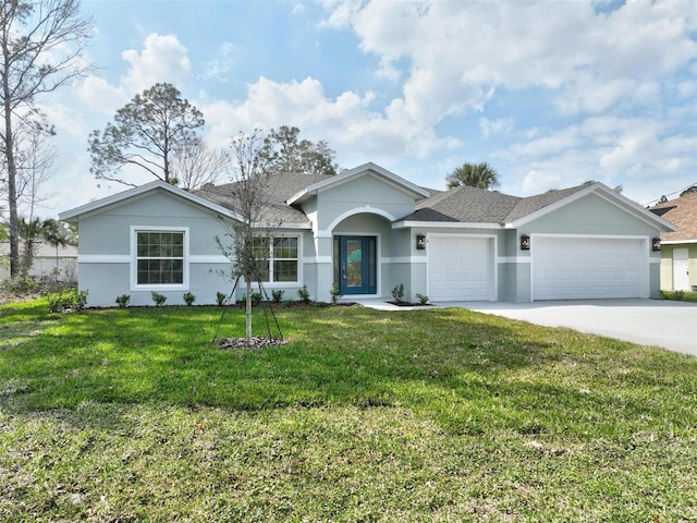 single story home featuring a garage and a front yard