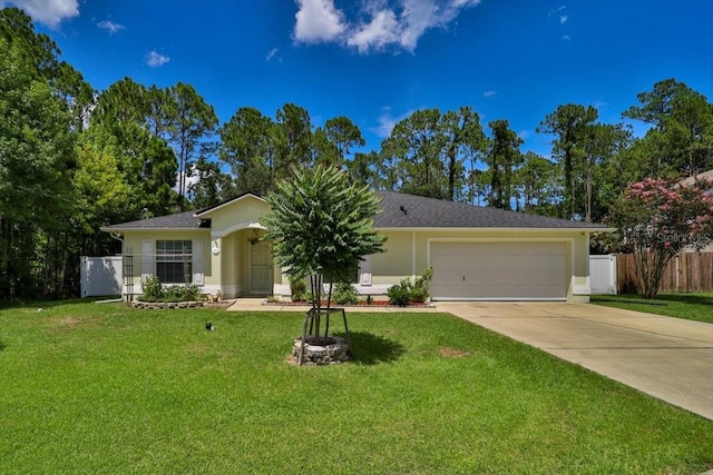 ranch-style home featuring a garage and a front lawn