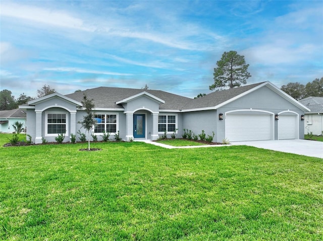 single story home featuring a garage and a front lawn