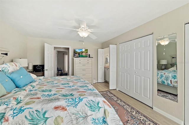 bedroom featuring a closet, ceiling fan, and light hardwood / wood-style flooring