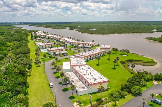 drone / aerial view with a water view