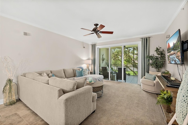 living room featuring ceiling fan and crown molding