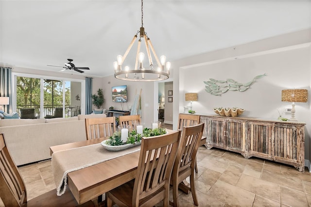 dining room with ceiling fan with notable chandelier