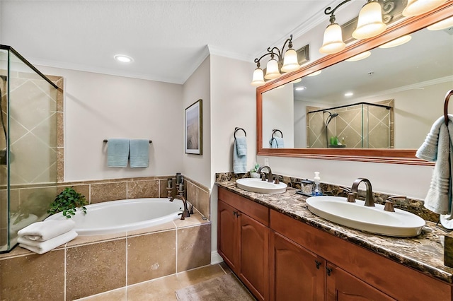 bathroom with vanity, crown molding, and shower with separate bathtub