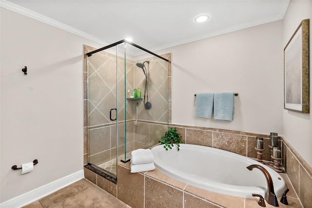 bathroom with tile patterned flooring, crown molding, and shower with separate bathtub