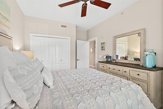 bedroom with ceiling fan and a closet