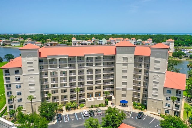 view of building exterior with a water view