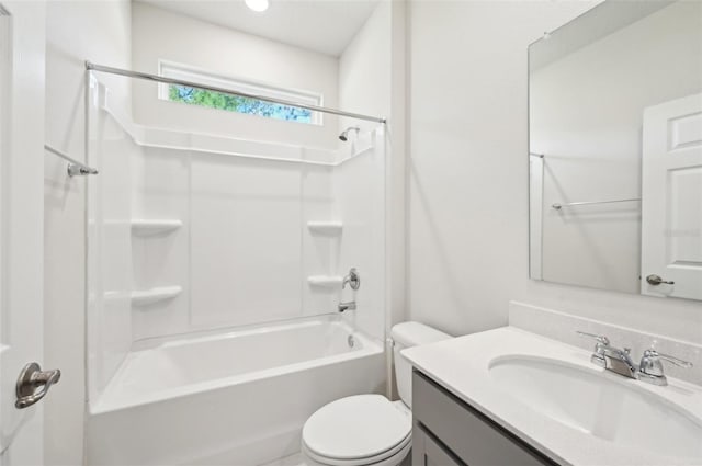 full bathroom featuring bathtub / shower combination, toilet, and vanity