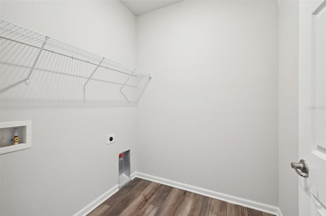 laundry area featuring dark hardwood / wood-style flooring, electric dryer hookup, and hookup for a washing machine