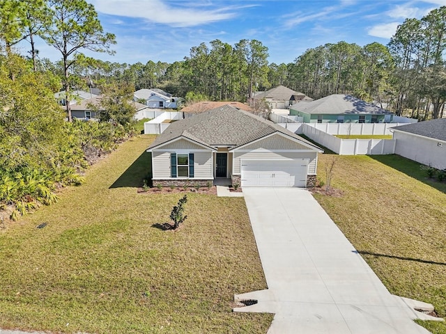 ranch-style house featuring a front lawn and a garage