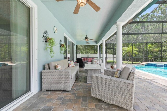 sunroom with ceiling fan