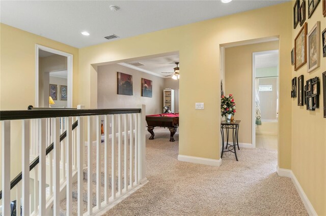 corridor with carpet floors