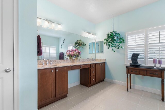 bathroom featuring dual vanity and tile patterned flooring