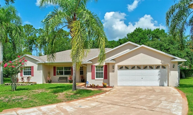 ranch-style house with a garage and a front lawn