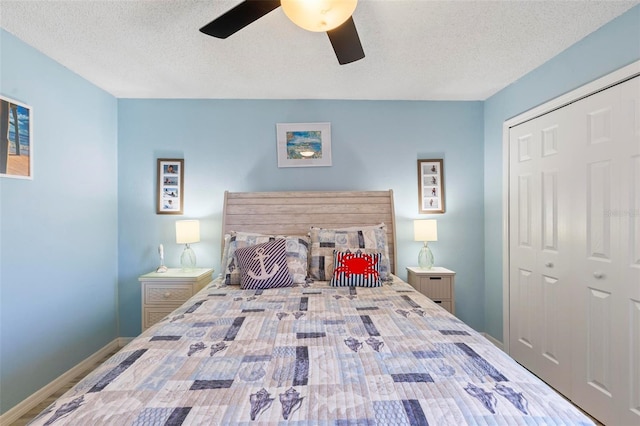 bedroom with a textured ceiling, a closet, and ceiling fan