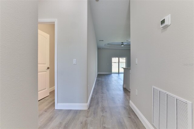 hall with light wood-type flooring