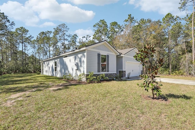 ranch-style home with a garage and a front lawn