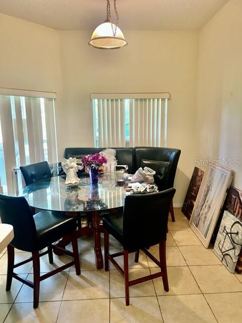 dining room with light tile patterned floors