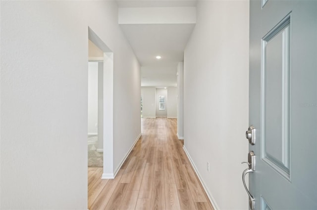 corridor featuring light hardwood / wood-style flooring