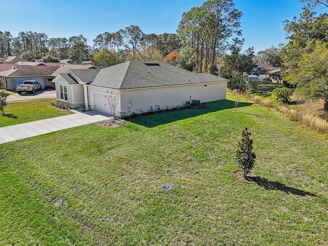 view of property exterior featuring a garage and a lawn