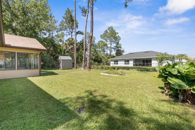 view of yard with a storage shed