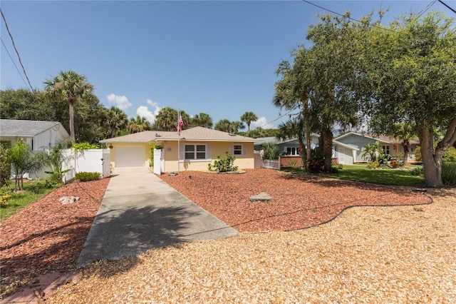 single story home with a garage