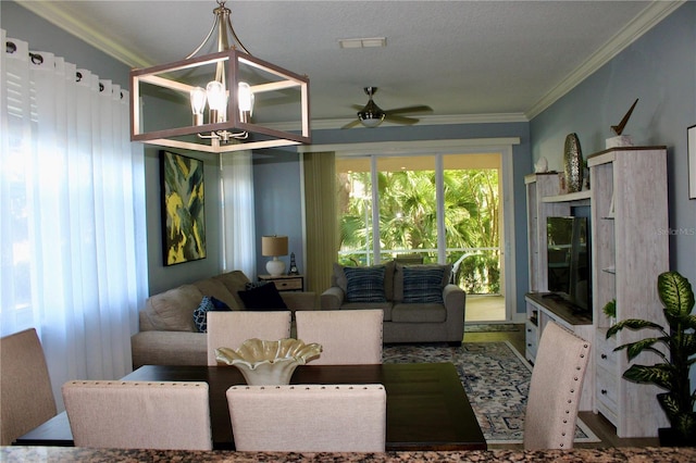 living room with hardwood / wood-style floors, a textured ceiling, crown molding, and ceiling fan with notable chandelier