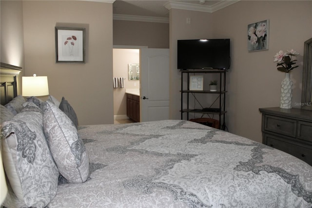 bedroom featuring ensuite bathroom and crown molding