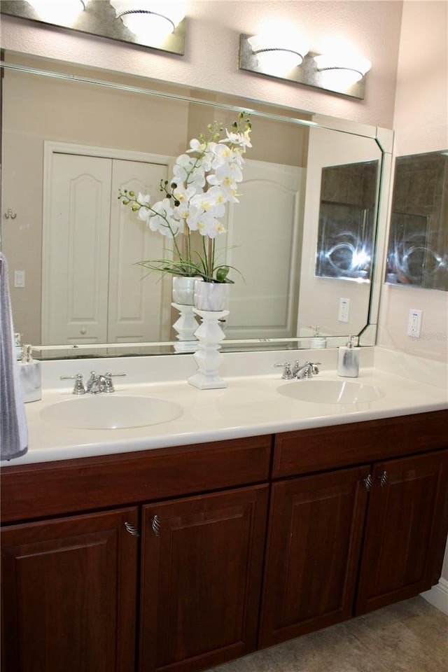 bathroom featuring double vanity