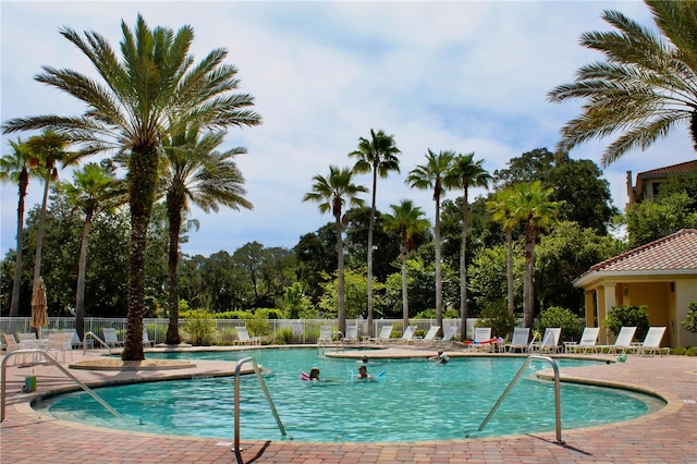 view of pool featuring a patio area