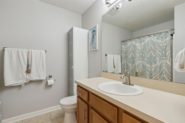 full bathroom with visible vents, toilet, vanity, a textured ceiling, and tile patterned floors